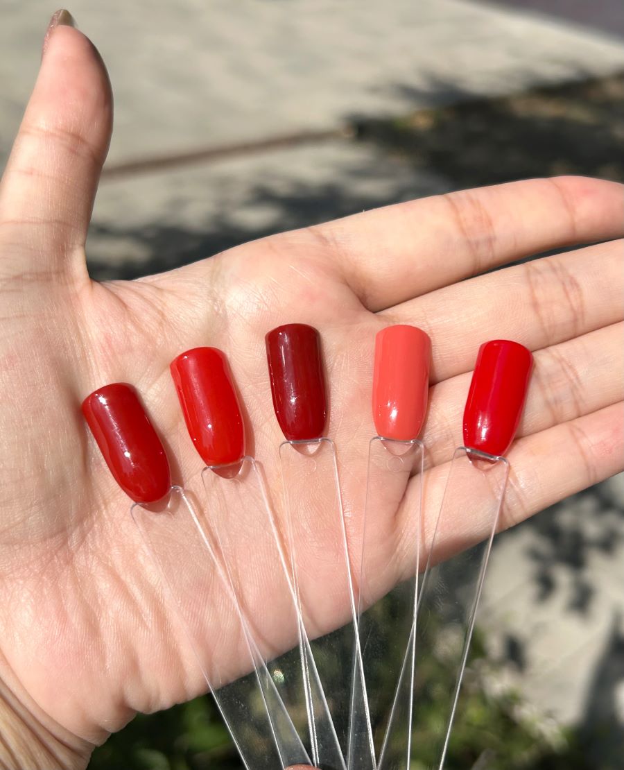 What nail color could go with a red /orange dress to a formal dinner? -  Quora